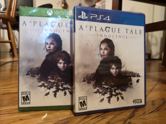 The cases for the Xbox One and PlayStation 4 versions of A Plague Tale, standing upright on a wooden tile floor